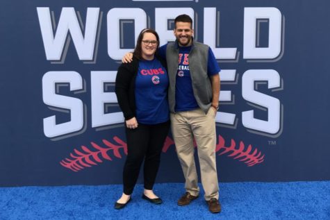 Flueckiger and JMU grad Ryan Campbell pose outside of the Cubs World Series gala, planned by Flueckiger and her company. 