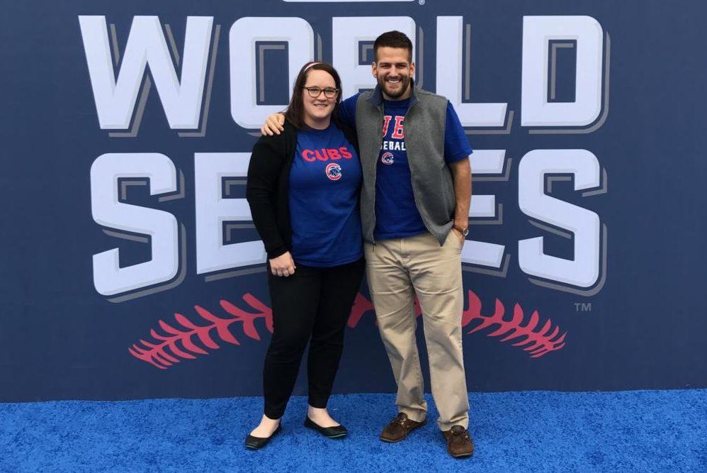 Flueckiger and JMU grad Ryan Campbell pose outside of the Cubs World Series gala, planned by Flueckiger and her company.
