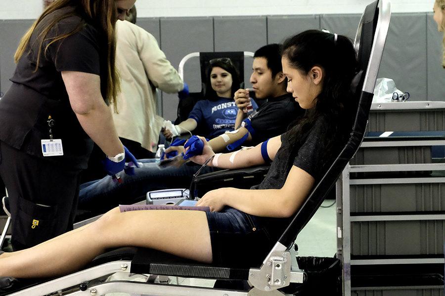 Junior Precious Carper gets her blood drawn during her lunch block.