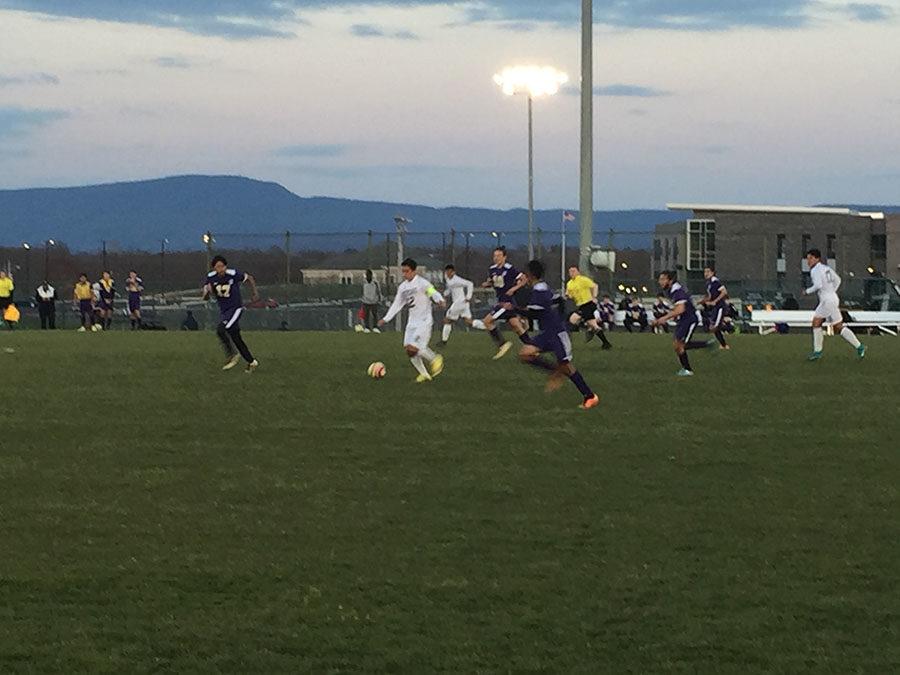 The blue streaks have the ball.