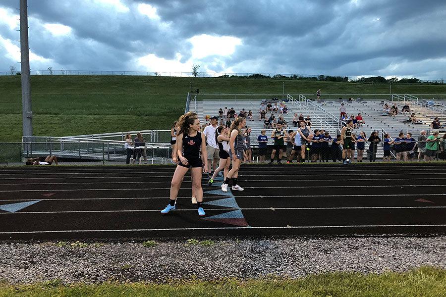 Freshman Sydney Shaver gets ready to receive the baton during the 4x400 meter relay.