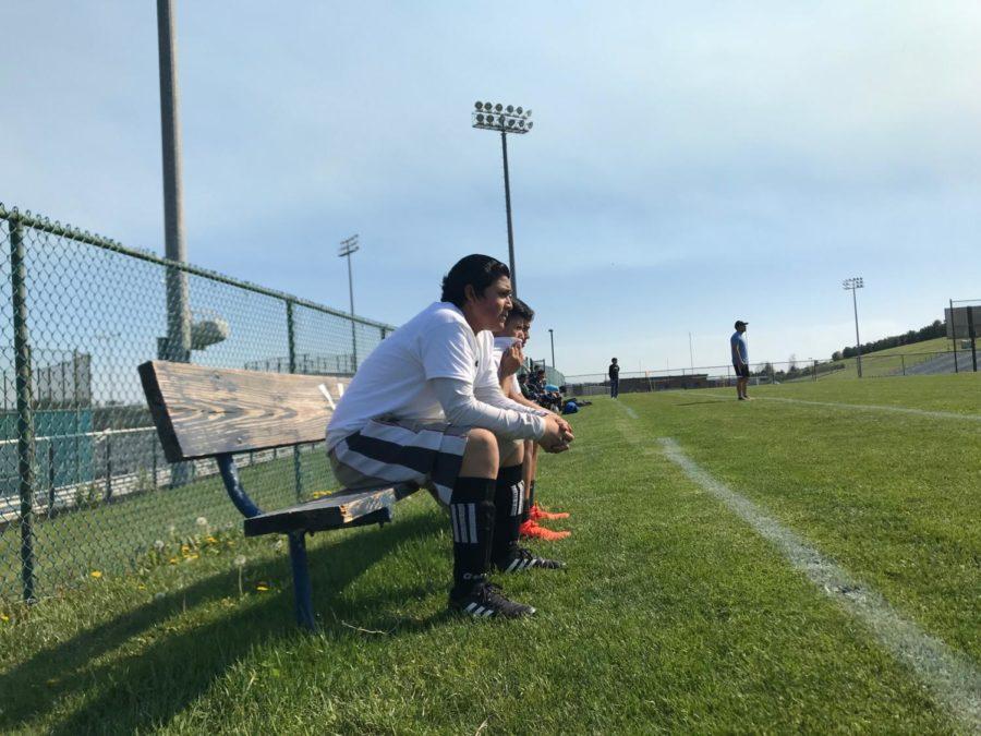 Thomas Harrison middle school students watch the friendly match from the side lines.