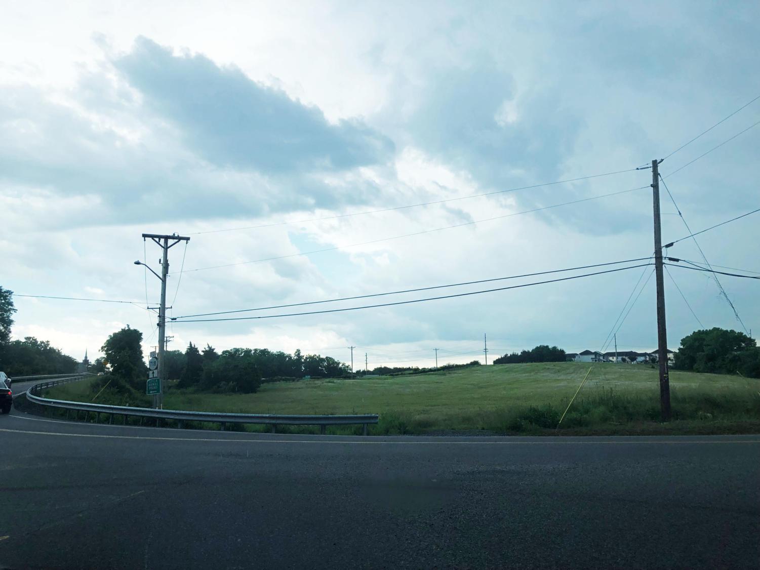 A plot of untouched land resides on Old Furnace Road, as a much more viable option for the location of a new high school.