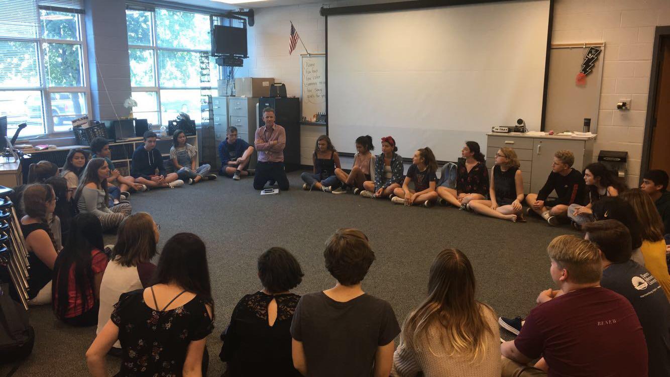 Students interested in auditioning for the one act sit in a circle during an after school meeting. At the meeting, new director Ken Gibson announced that the theme plot would follow the story of Buddha.