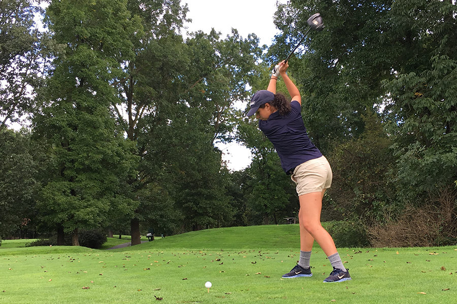 Junior Jane Thompson drives off the tee during a match. Thompson is the first girl in Harrisonburg golf’s history to make the first seed on the All-District team. Honestly, it would have felt the same if they were all girls. They’re just competitors,” Thompson said.