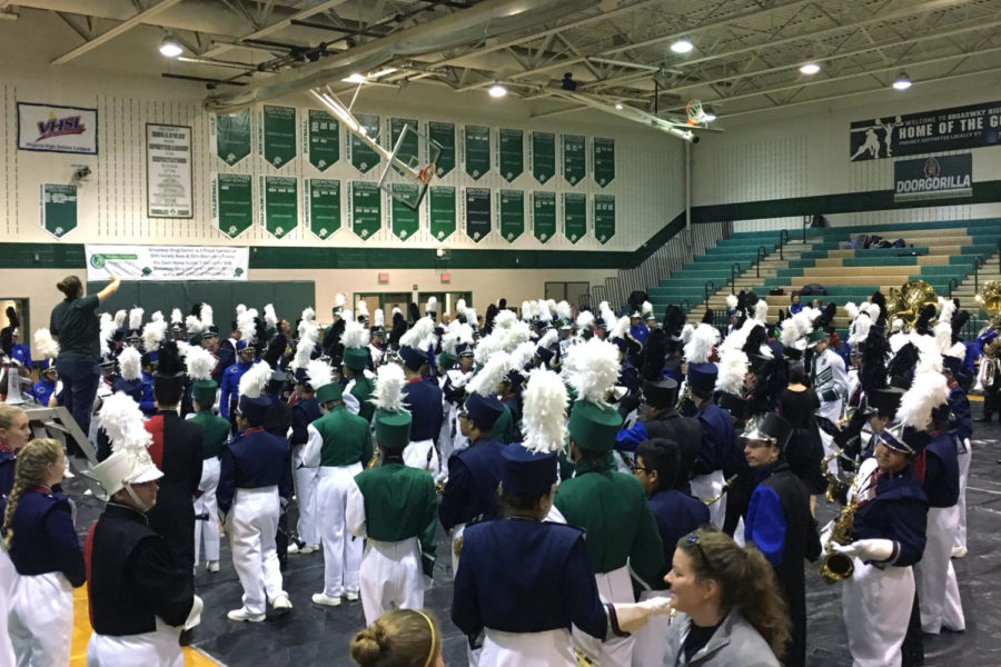 The bands perform inside Broadways gym due to rain. This showcase happens before the formal competitions of the season. “It’s just an overall really fun experience, especially when there’s no trophy. It’s just pure fun,” senior color guard captain Glorious Njoroge said. 