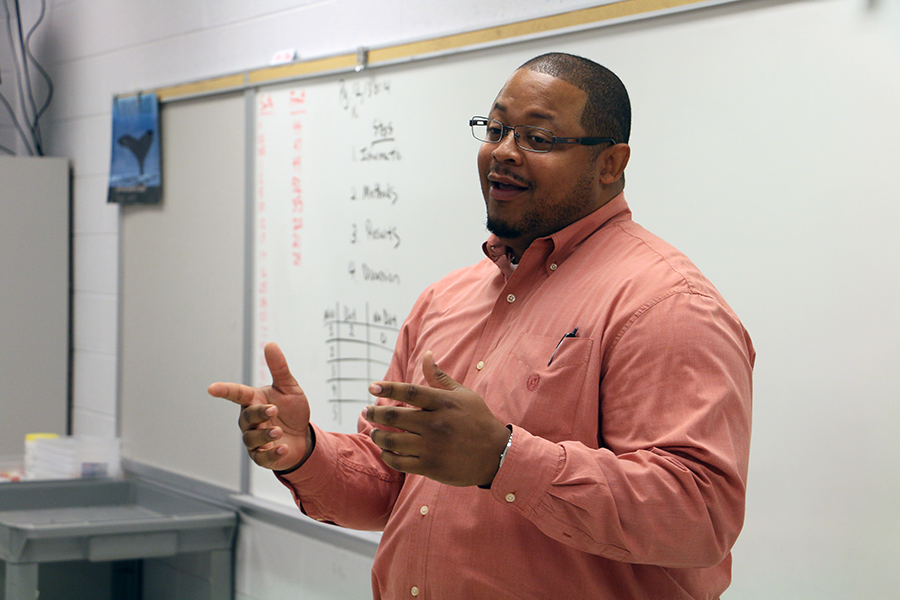 Special education teacher Daniel Woodard speaks to a Summit Academy class. “My focus has been more on trying to prevent these kids from getting in trouble and inspiring them to be more than they believe they are,