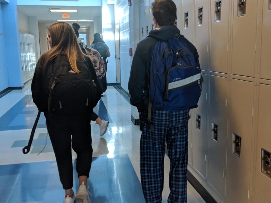 Freshman Dylan Burnette wears striped pants and a sweatshirt for pajama day