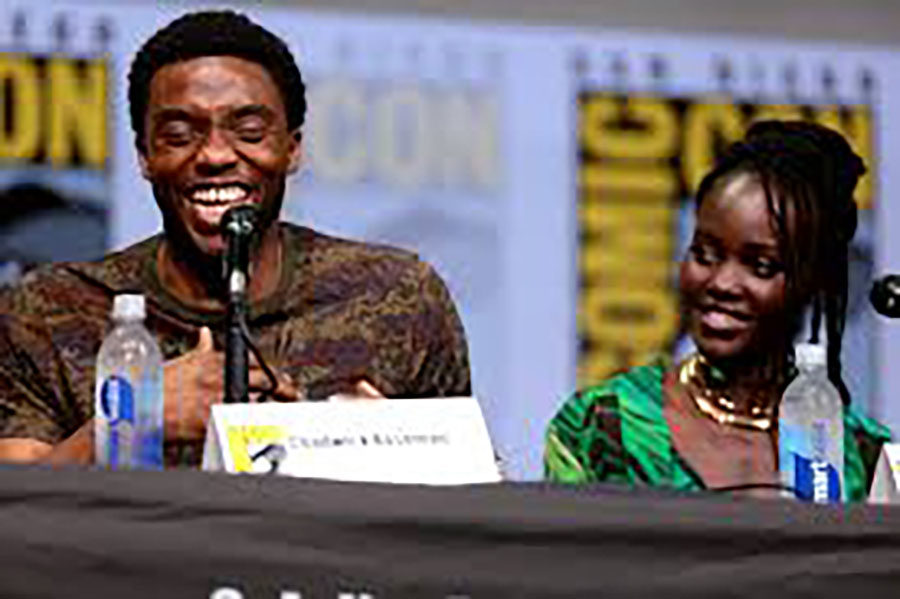 Chadwick Boseman and Lupita Nyongo, two members of the cast of Black Panther, talk at a press conference. Black Panther, an internationally acclaimed movie, released in February. 