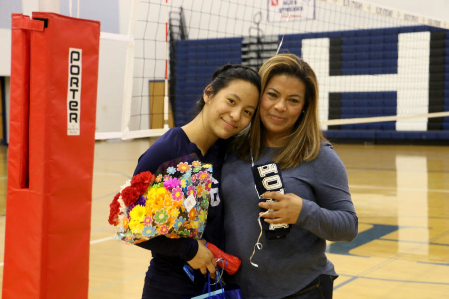 Senior Juliana Lee poses with her mom during the introduction ceremony. 