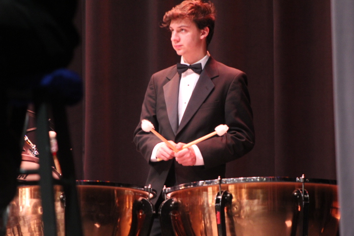 Senior Sam Schaeffer participates as a percussionist in the concert.