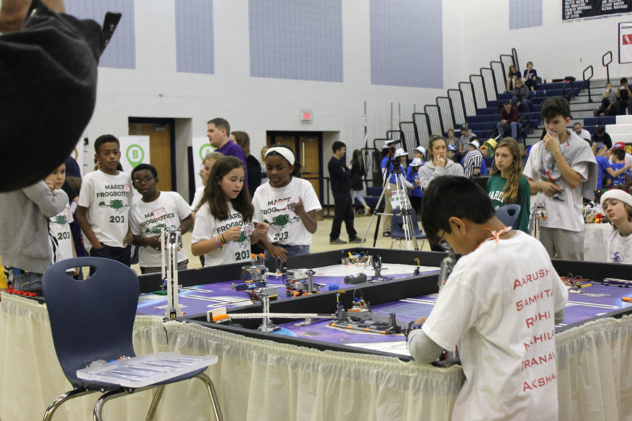 Elementary and middle school students take part in the LEGO tournament.