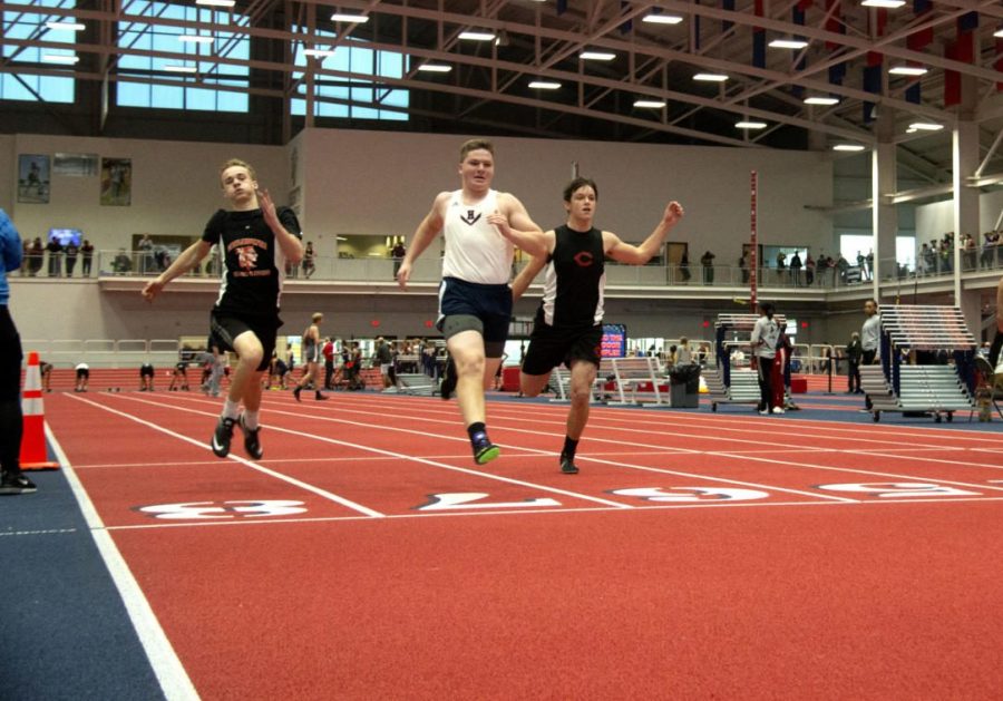 Senior Conor Wells competes in the 55 meter dash at Liberty University in 2018. 