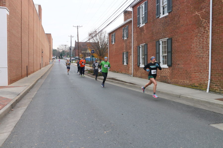 Runners make their way through the four mile long course.