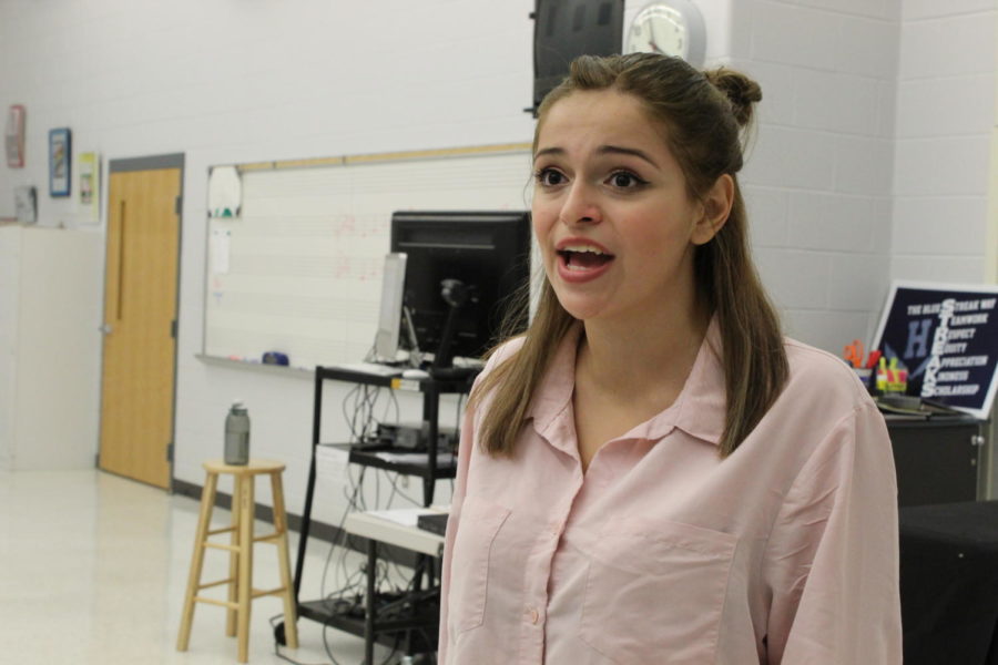 Junior Gia Yoder rehearses a piece in the choir room before auditioning for this years musical, Legally Blonde. 