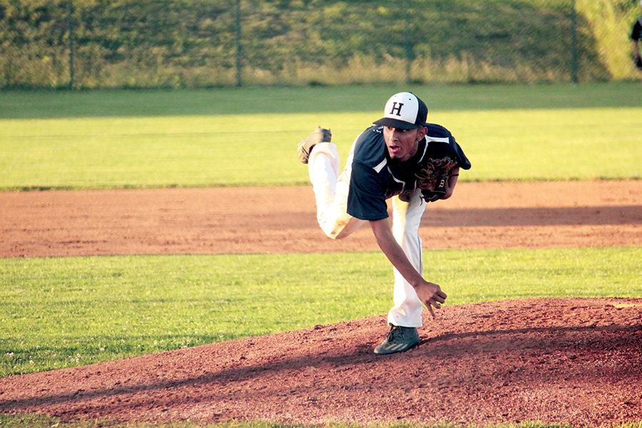 Jose Rocha throws a fastball down to a batter in the Regional semi-finals during his sophomore year. The game went to the tenth inning and ended with the Streaks having a walk win. The final score of 14-13 sent the Streaks to the state tournament.