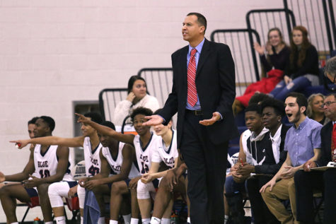 Boys varsity basketball defeats TA 74-55