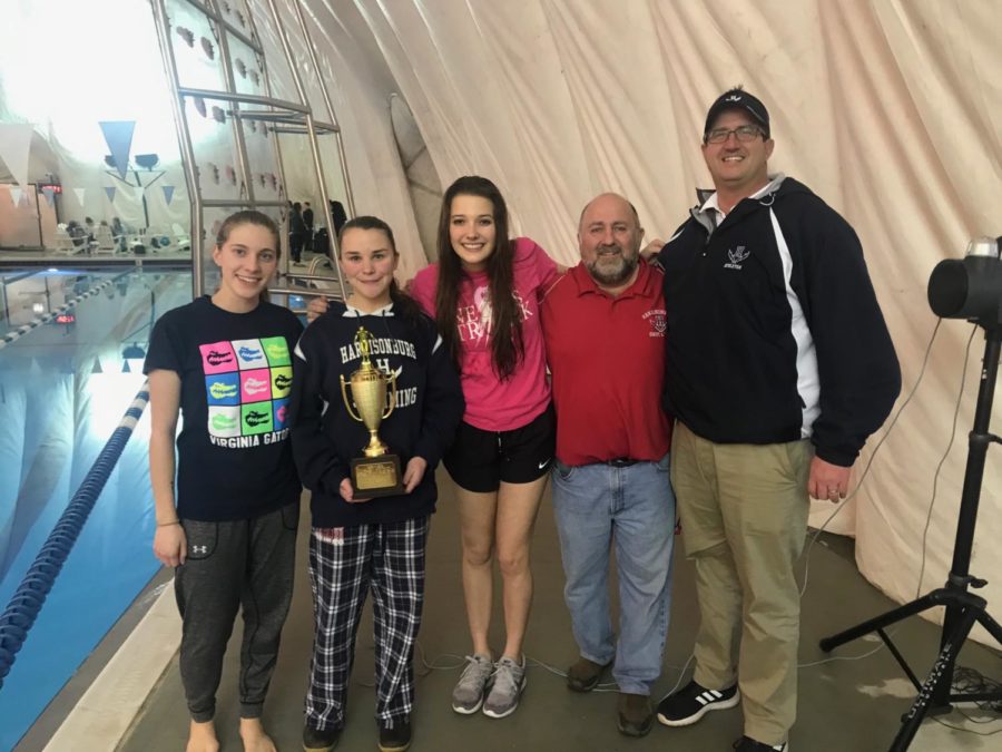 Seniors+Christa+Cole%2C+Andi+Fox+and+Samantha+Little+receive+the+teams+trophy+for+placing+first+in+the+District+meet.+In+the+19+years+of+the+HHS+swim+teams+existence%2C+this+is+the+first+time+they+placed+first+in+the+Valley+District+Championship.+