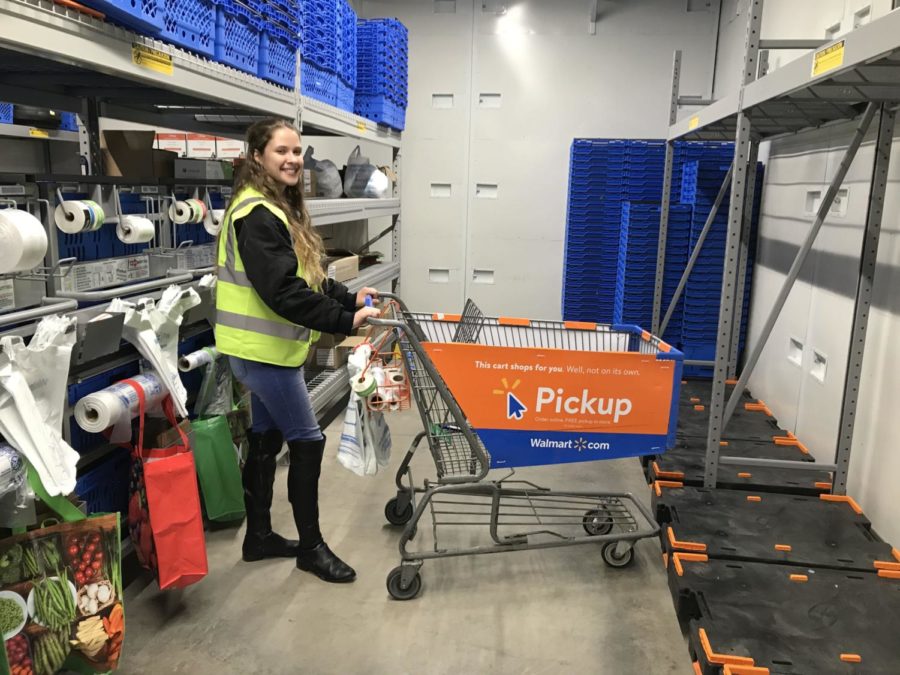 Sophomore Tessa Lohnes works in the online grocery pickup department at Walmart.