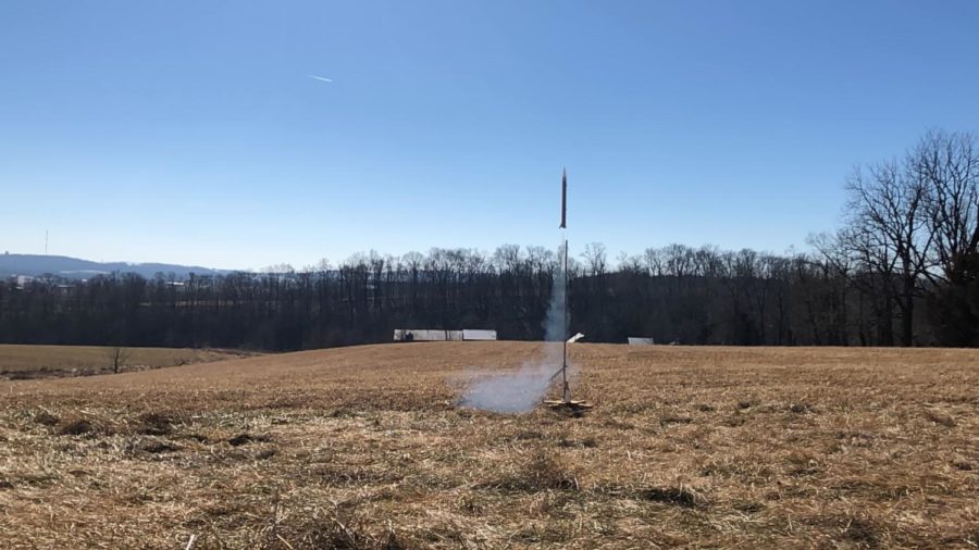 This rocket has a motor not as powerful as some of the others, shown by the amount of smoke exhausted.