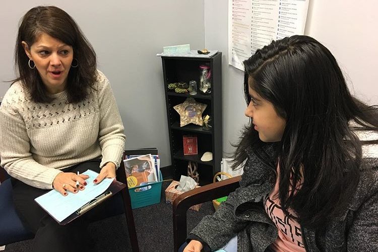 Counselor Danielle Brino begins scheduling classes for freshman Nora Yousif for the 2019-2020 school year. 