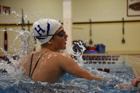 McCay finds success in freshman swim season, breaks school records