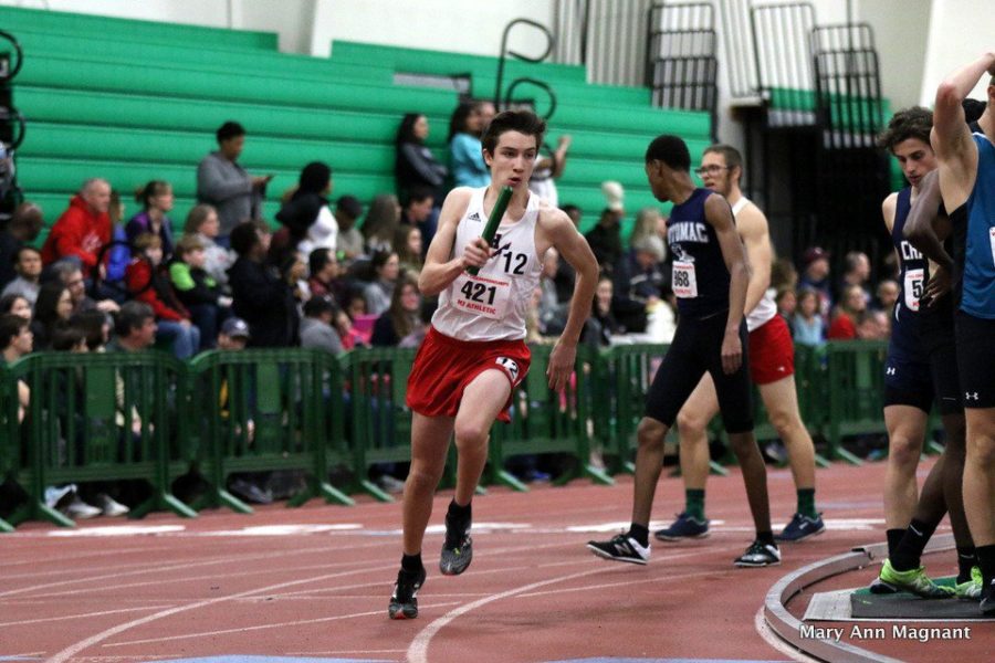 Sophomore David Beck sprints away from the line after receiving his hand off from Hulleman. 