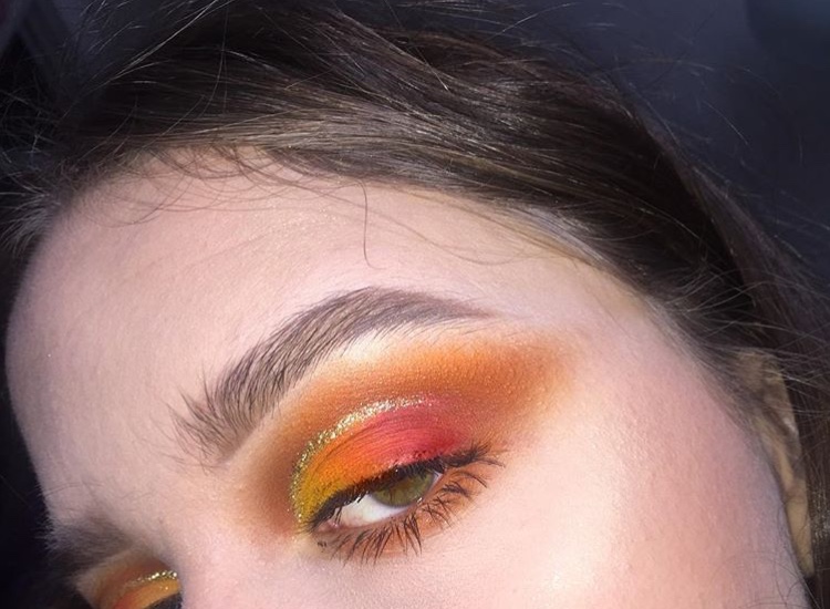 Junior Ruby North-Sandel shows off one of her bright eyeshadow looks. North-Sandels makeup Instagram account is @rubysmakeupp. 