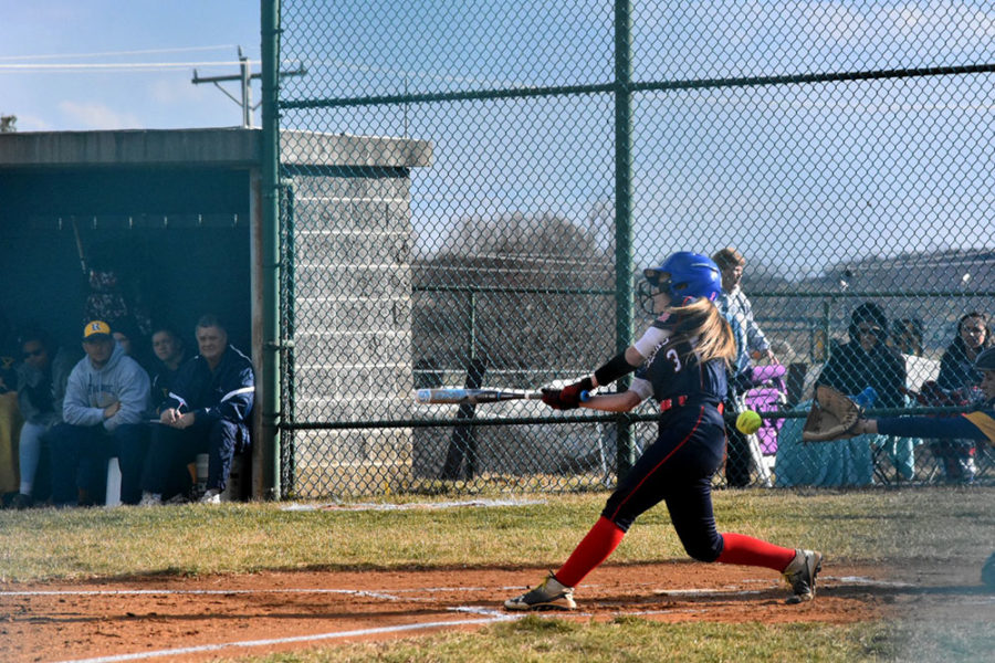 Sophomore Karleigh Gentry follows through her swing.
