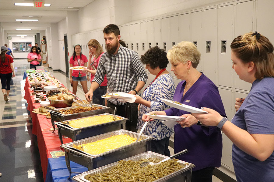 English teachers Aaron Cosner and Cathy Soenksen came down during the second group to grab some lunch.