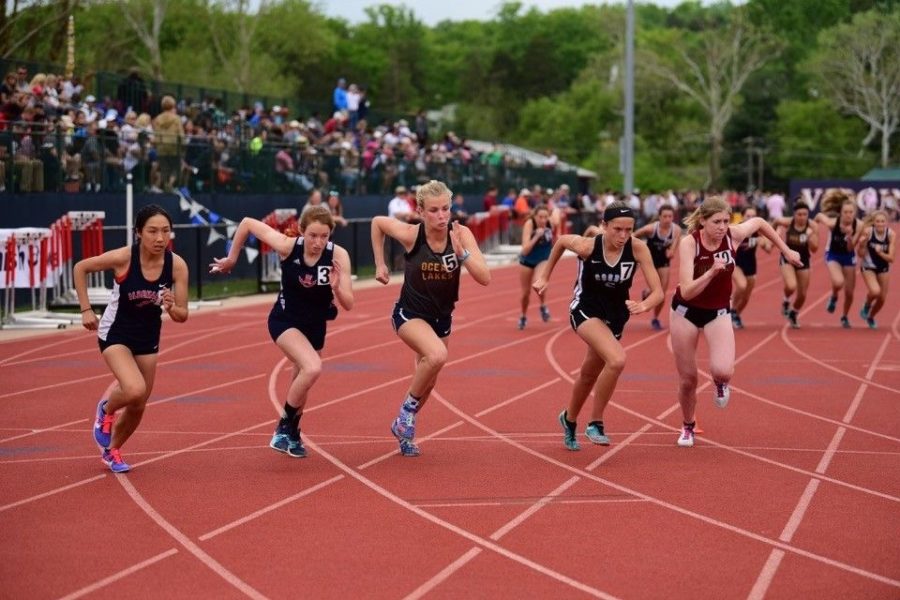 Senior Hannah Miller (second from left) competes in the Dogwood Track Meet in Charlottesville at University of Virginia. Miller runs for the Streaks in cross country, indoor track and outdoor track. She plans on continuing her running career at Elon University in the fall. 