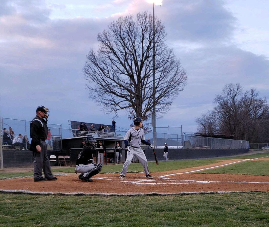 Sophomore Aidan Perkins prepares to hit the ball when hes up to bat  against the Knights of Turner Ashby.