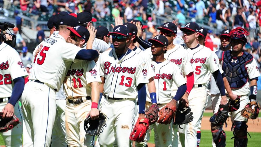 Braves players walk off the field after winning a game earlier this season. Photo courtesy of MLB.com