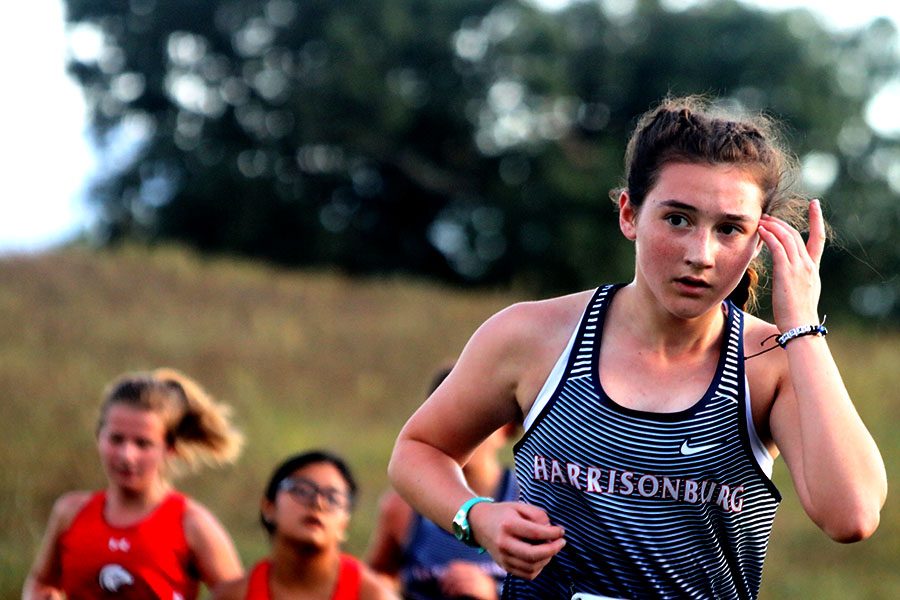 Freshman Emma Maddox competes alongside East Rock in the girls JV race Sep. 18. Maddox finished with a time of 30:11.