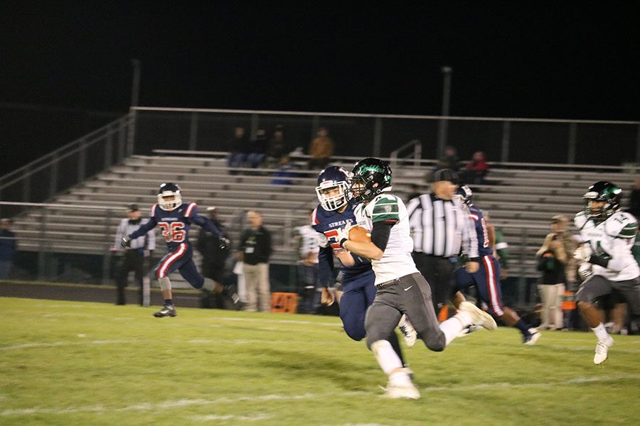 #23 Junior Xander Collazo chases down the Broadway player.