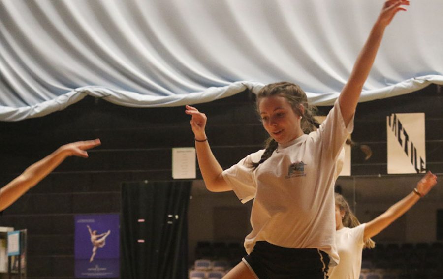 Sydney Shaver dances with classmates during a rehearsal for an upcoming Fine Arts showcase.
