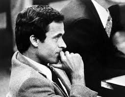 The real Ted Bundy listens to a defendant during one of his trials. 