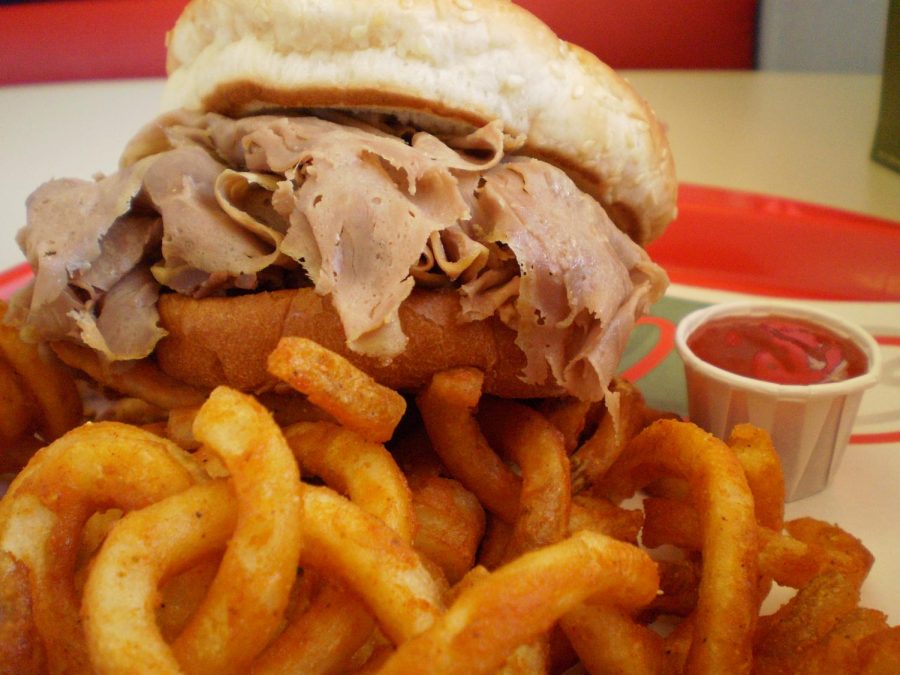 Arbys+medium+roast+beef+sandwich+with+curly+fries+is+one+of+Arbys+iconic+meals.+Arbys+sandwiches+appear+to+be+80%25+meat+and+20%25+bread.
