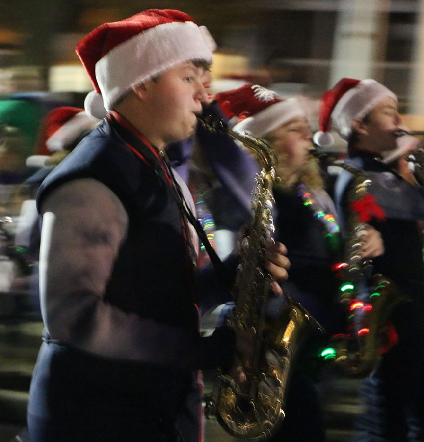 The saxophone players follow down into the parade.  