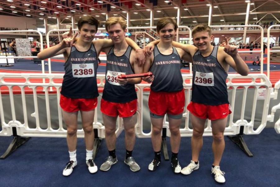 The+4x800+boys+indoor+track+team+celebrates+after+breaking+a+school+record+Jan.+4+at+the+Bulldog+Invitational+at+Liberty+University+with+a+time+of+8%3A12.25