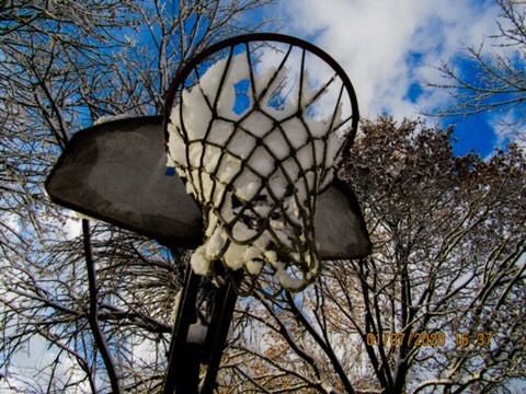 A basketball hoop covered in snow taken by freshman Kaley Bond while practicing her photography. 