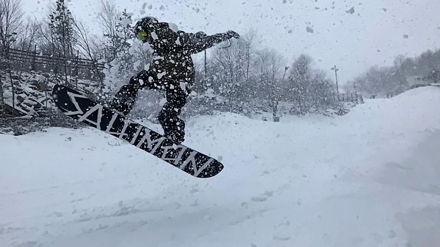 Junior Thomas Shulgan hits a jump on Diamond Jim at Massanutten Ski Resort. "I really prefer Paradice but Diamond Jim is the only black diamond open right now so it has to do," Shulgan said.