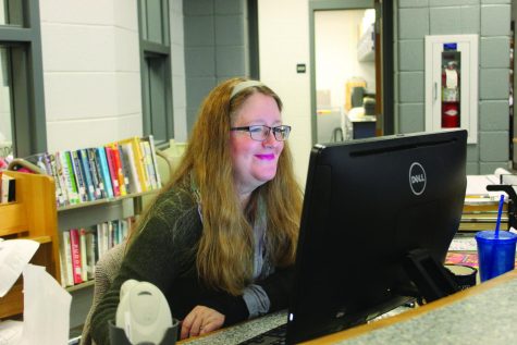 Librarian Karen Kaznosky works at her desk in the library. This is her normal spot when she isn’t helping students throughout the library.