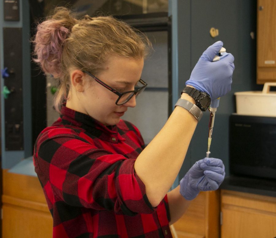 Senior Jade McLeod adds Hae III to a sample of her DNA, as part of a lab in Biotechnology. The purpose of the lab was to find out if students' DNA had a gene responsible for a certain bitter taste.