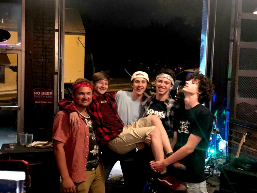 (From left to right) HHS alum Alex Osinkosky, sophomore Dylan Thompson, Spotswood senior Colin Gregory, sophomore Keenan Glago, and Spotswood senior Reece Wayland all stand together following their second show. The band played at Restless Moons brewery in June, 2019. 