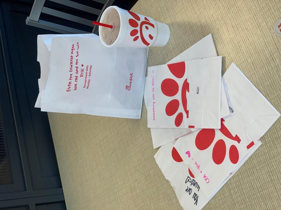 Chick-fil-A owner, Ashley Bellamy, has encouraged her employees to begin writing encouraging notes on all bags given to customers through the drive-thru window. 