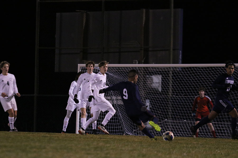 Senior Dlovan Hassan kicks the ball to make a goal. 