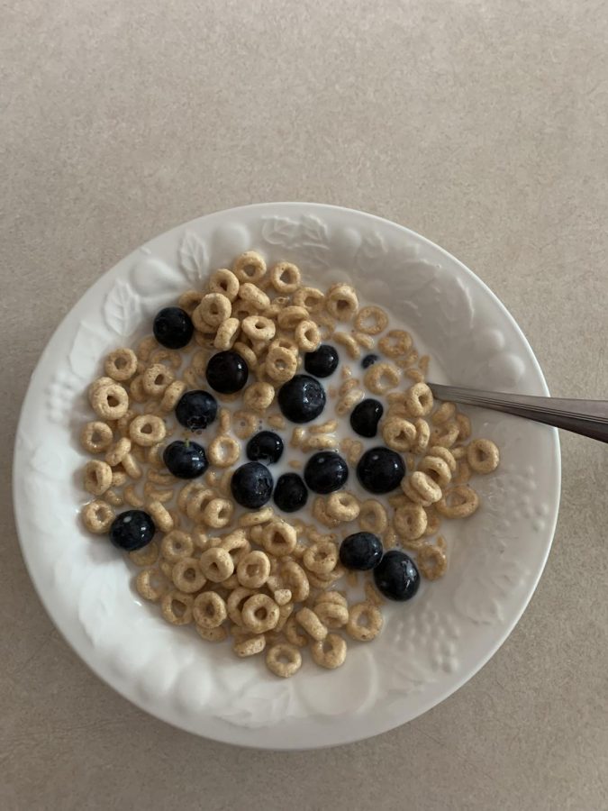 9:30 To start off her day, Medhin has Honey Nut Cheerios with blueberries for breakfast. 