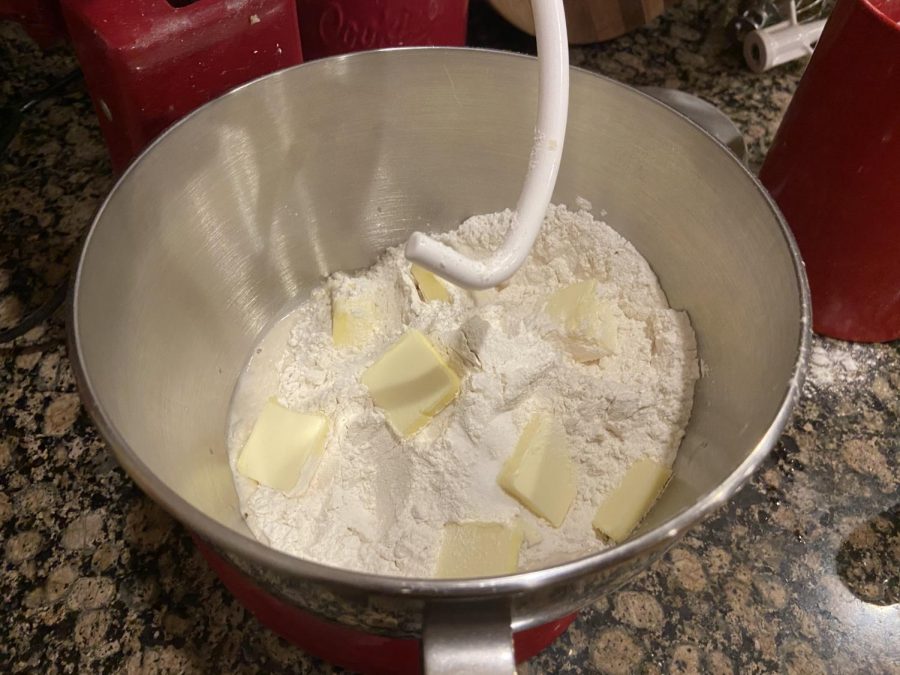 After proofing the yeast, mix the rest of the ingredients in the mixer using the dough hook until combined.