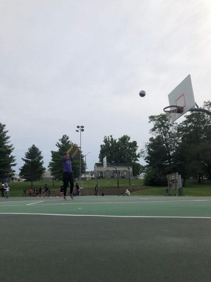 Once his homework is done, Burgess goes outside and practices his shot for basketball. He decided to head over to Ralph Sampson Park. I typically go outside and shoot at least once a day if the weather is nice, Burgess said. 